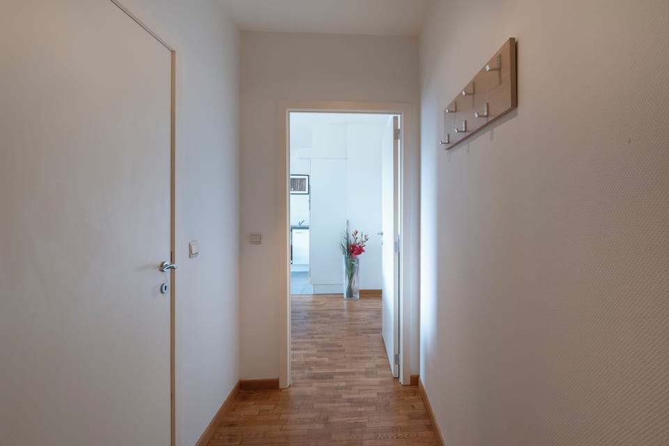 Apartment, City View | Living area | Flat-screen TV