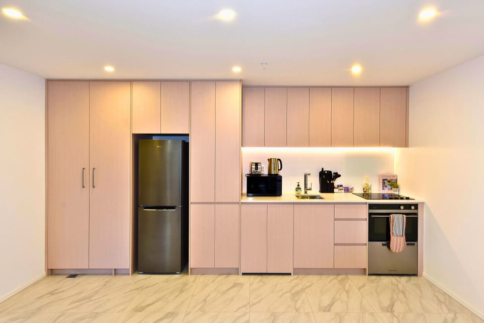 Fully equipped kitchen with full-size fridge and oven