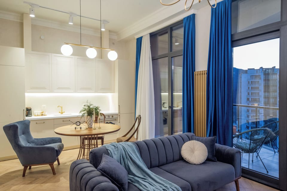 Apartment, City View | Living room | Flat-screen TV