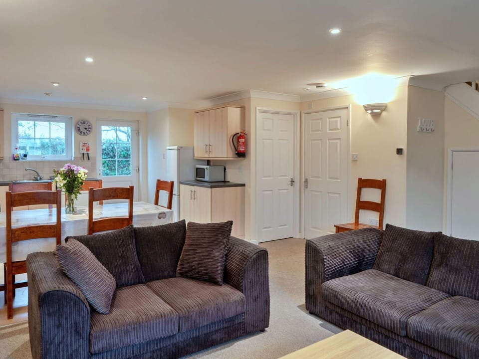 Furniture, Interior Design, Couch, Wood, Flooring, Floor, Ceiling, Room, Table, Living Room