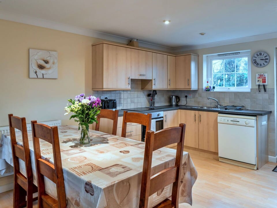 Furniture, Interior Design, Flooring, Kitchen, Wood, Floor, Countertop, Room, Ceiling, Cabinetry