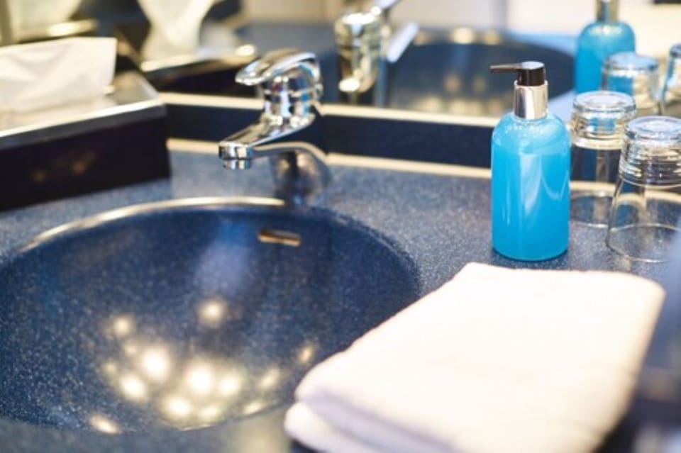 Shower, eco-friendly toiletries, hair dryer, towels
