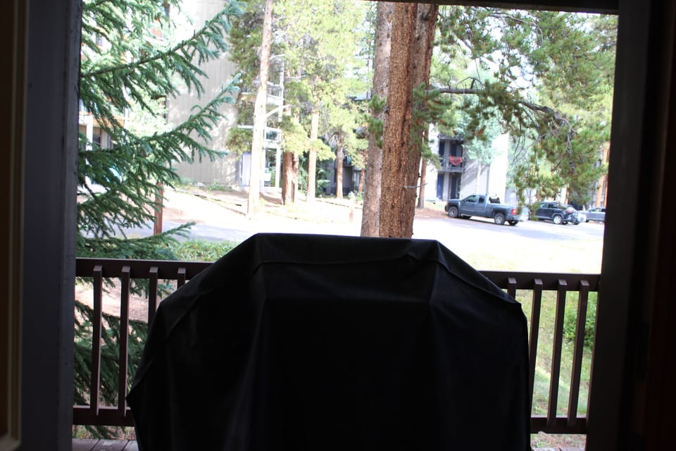 Grill - Natural gas grill, conveniently located on the private rear deck, just steps from the kitchen and the hot tub.