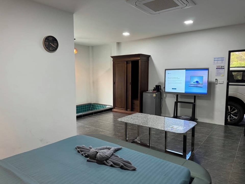 Family House, Patio, Park View | Living area | Flat-screen TV