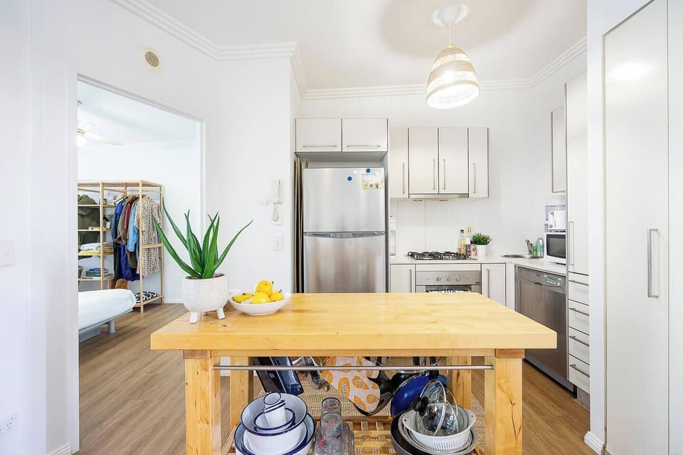 The kitchen comes fully equipped for meals at home with modern appliances and cooking utensils.
