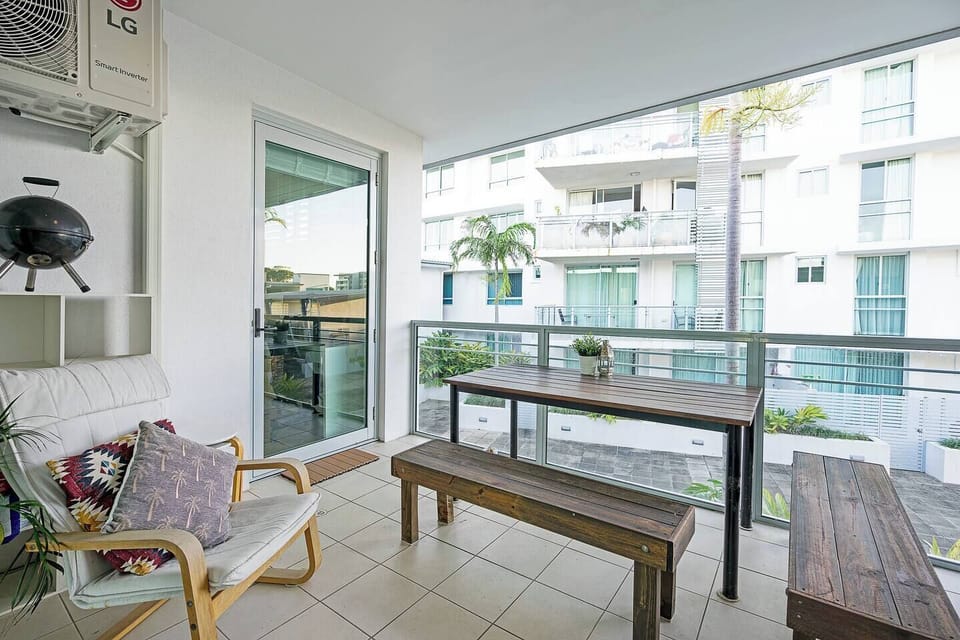 An enclosed balcony provides an idyllic spot to dine alfresco and captures fresh natural breezes.
