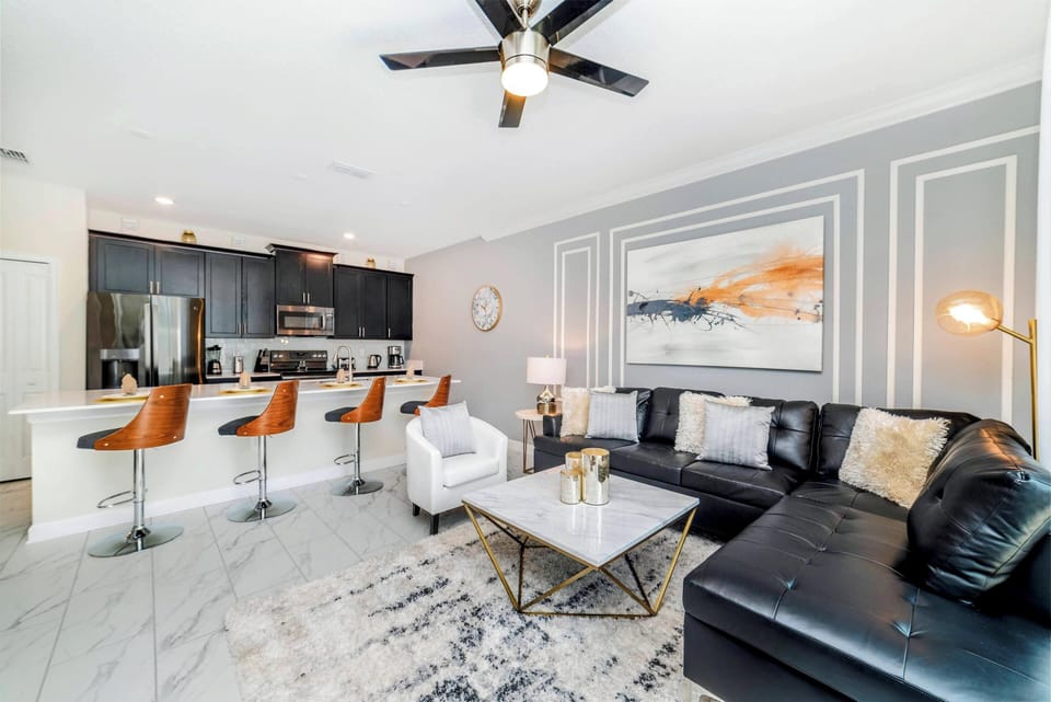 The bright and spacious living room is perfect for relaxing after a fun day out.