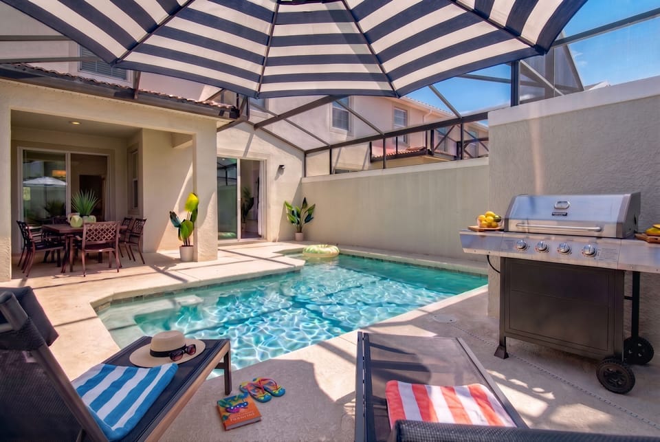 Relax in style! Our screened-in pool offers the perfect blend of sun & shade.