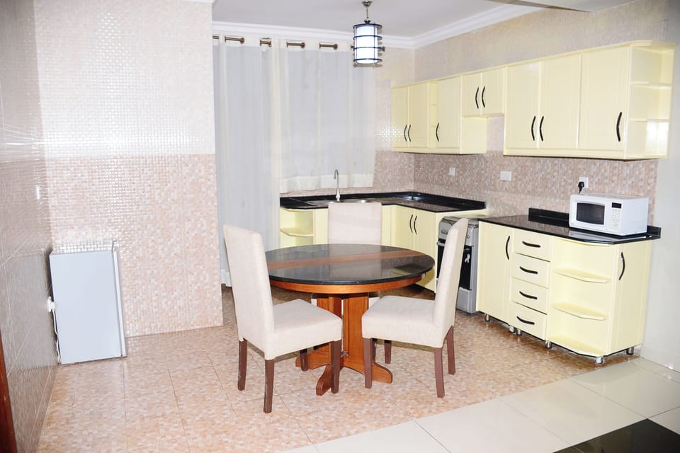 Family Suite, Balcony, City View | Private kitchen | Mini-fridge