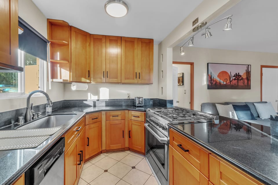 kitchen includes all dishware, flatware, cookware, and Keurig coffee maker.