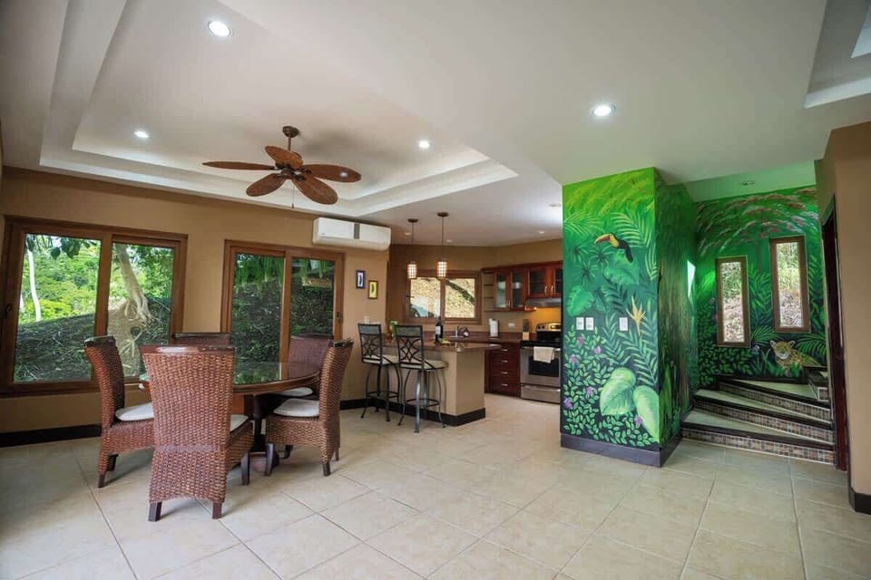 The house is surrounded by nature all around.