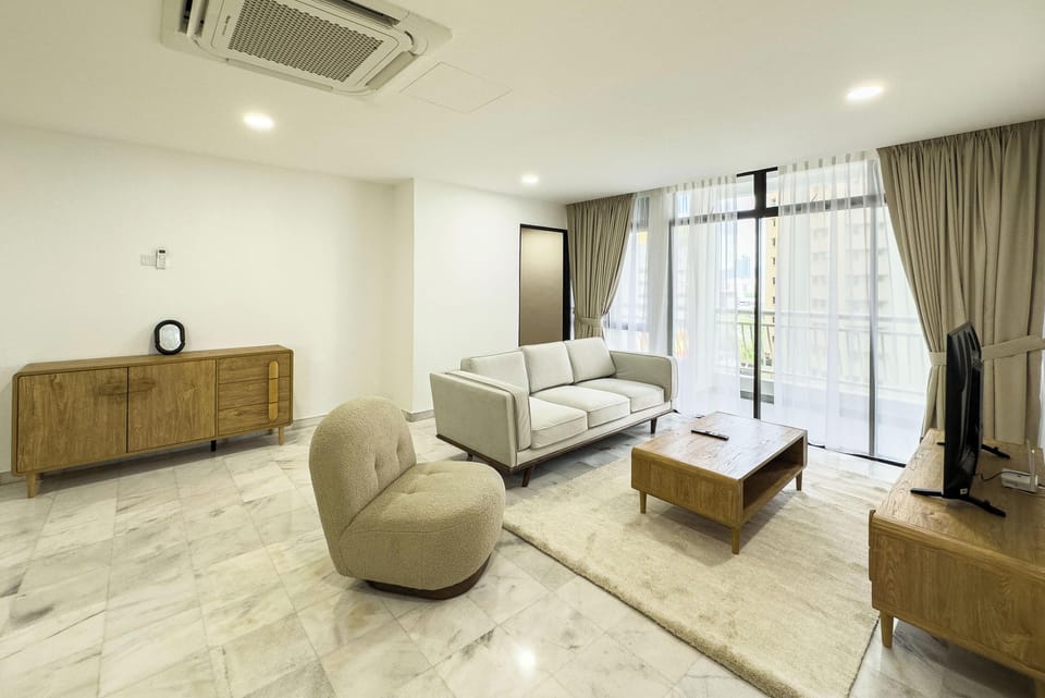 Family Condo, 3 Bedrooms, Balcony, City View | Living area | Flat-screen TV