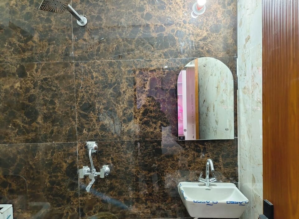 Shower, free toiletries, towels, soap