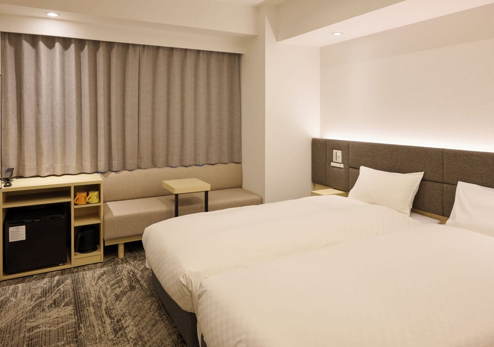 Twin Room Non smoking  | Down comforters, in-room safe, blackout drapes, WiFi (free)