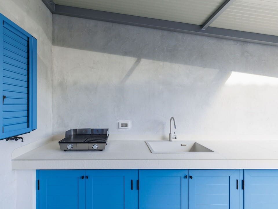 Blue, Interior Design, Flooring, Kitchen, Floor, Countertop, Composite Material, Tile, Tap, Plumbing Fixture
