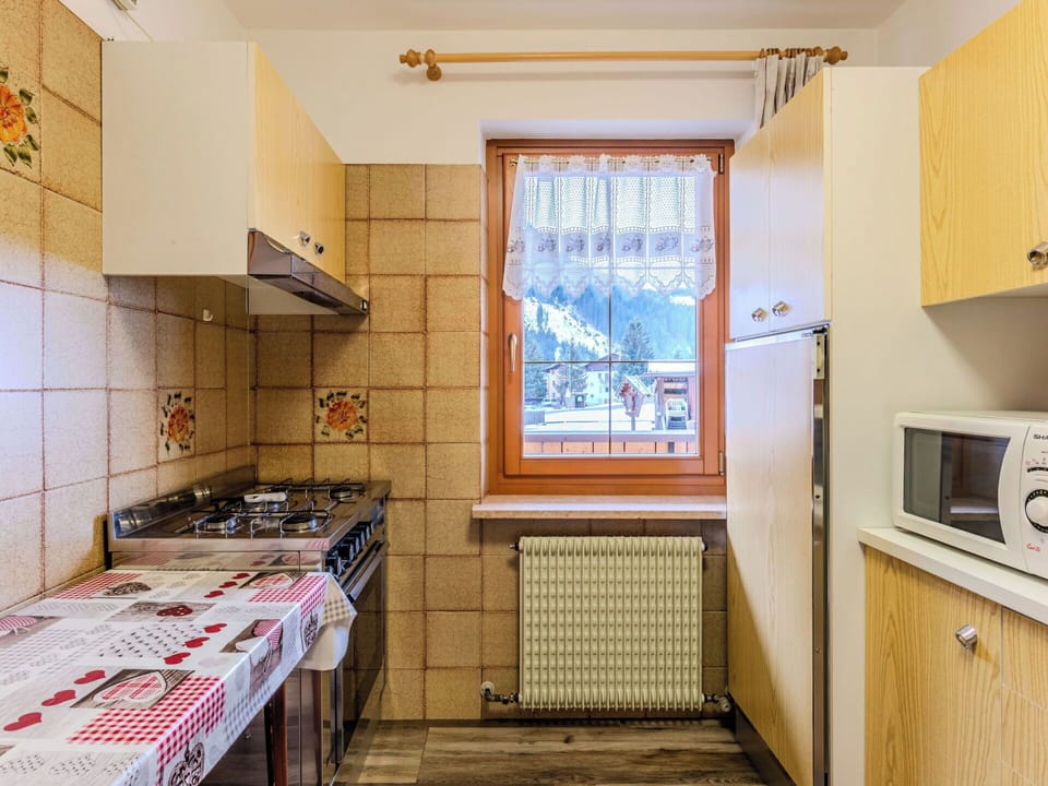 Kitchen, Wood, Major Appliance, Kitchen Appliance, Interior Design, Ceiling, Flooring, Countertop, Room, Cabinetry