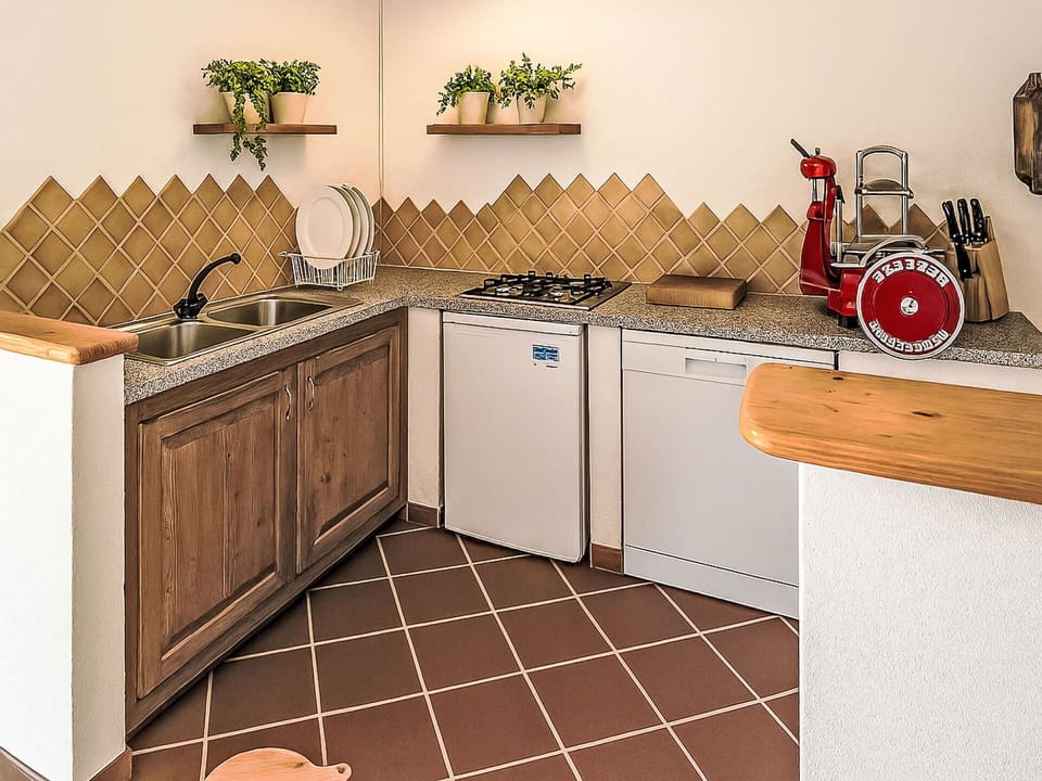 Kitchen, Wood, Countertop, Interior Design, Flooring, Kitchen Appliance, Major Appliance, Floor, Furniture, Cabinetry