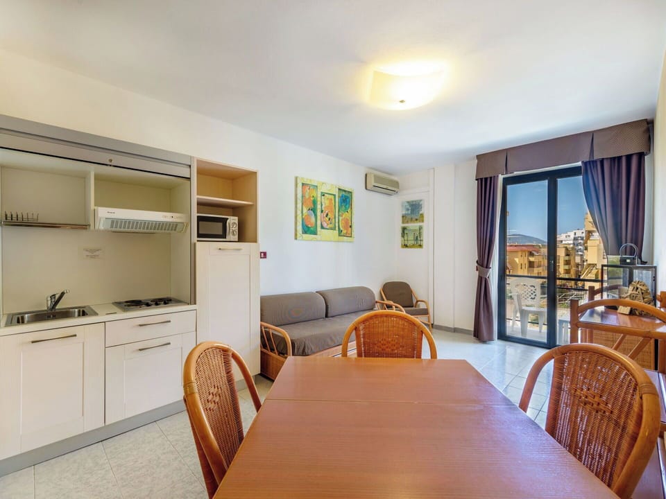 Apartment, Chair, Shade, Balcony, Resort, Kitchen & Dining Room Table, Hotel