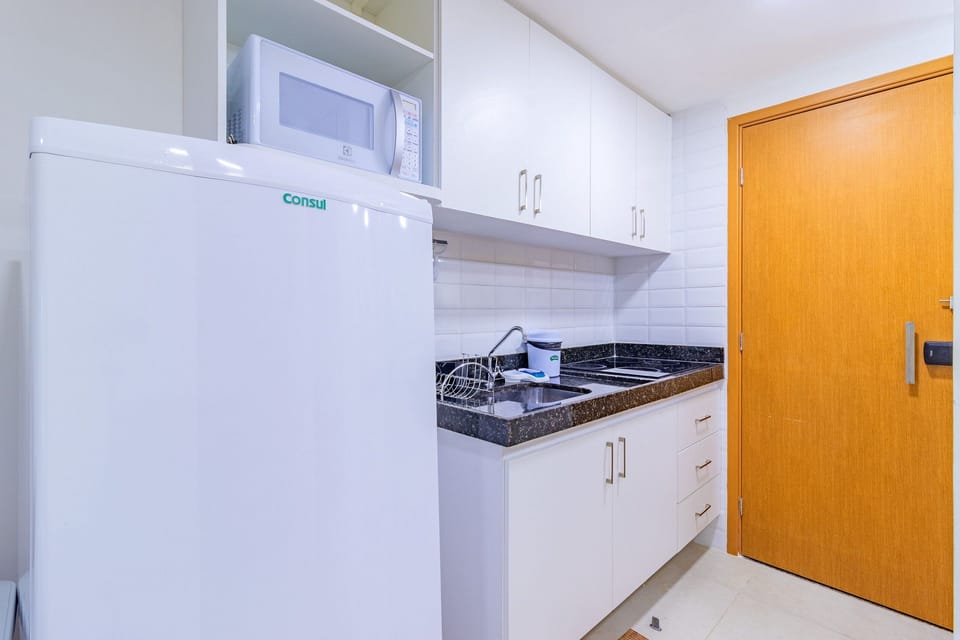 Basic Apartment | Private kitchen | Cookware/dishes/utensils, dining table