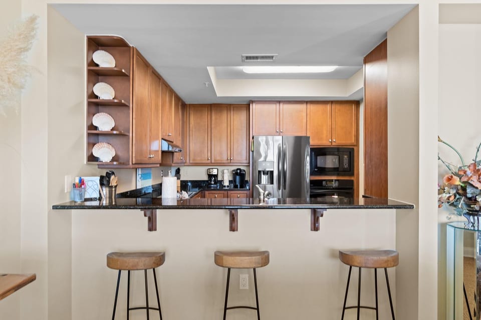 Condo, Multiple Beds (Indigo East 1402) | Private kitchen | Oven, toaster