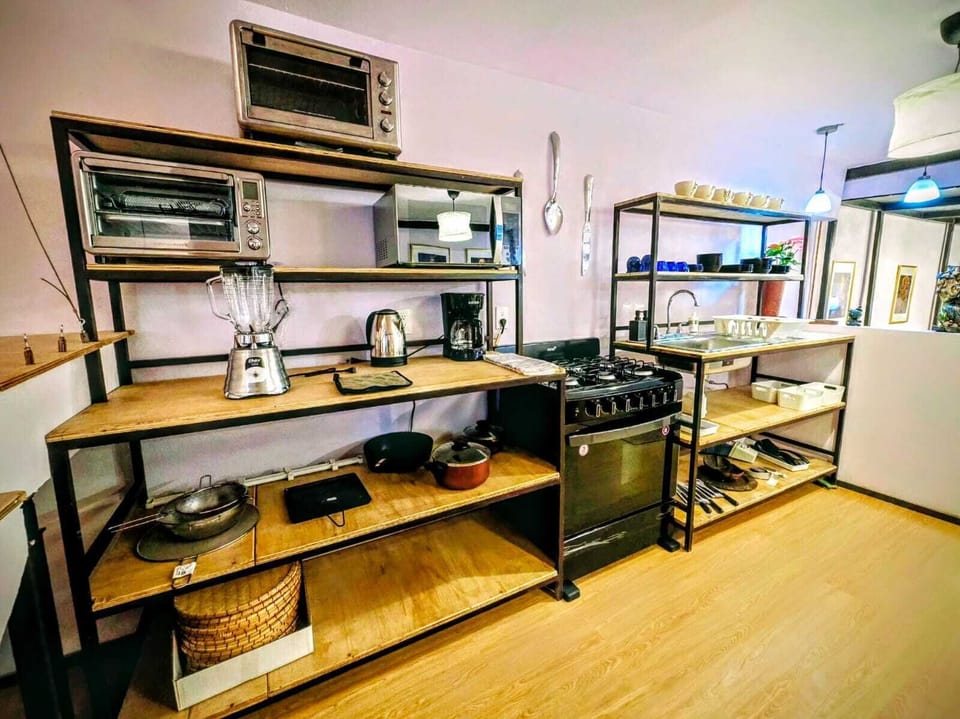 Mini-fridge, microwave, cookware/dishes/utensils