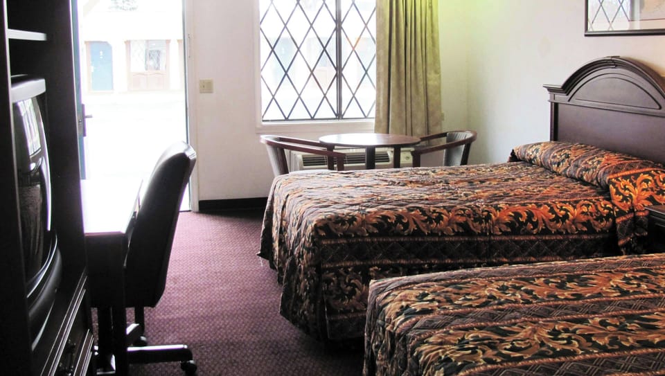 Desk, laptop workspace, blackout drapes, WiFi (free)