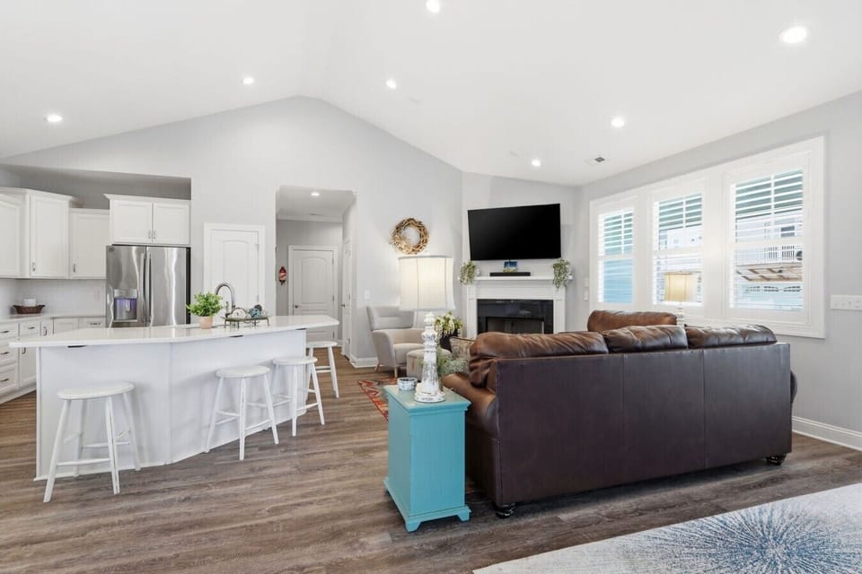 Designed for connection and relaxation, this open-concept living space brings everyone together