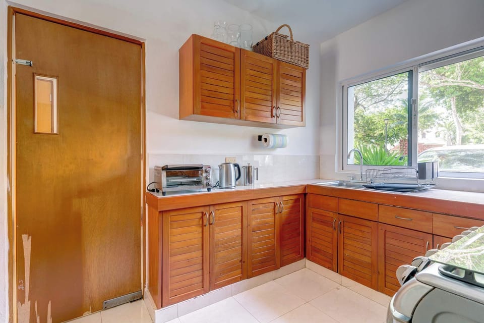 Prepare culinary delights in the bright kitchen with generous counter space.