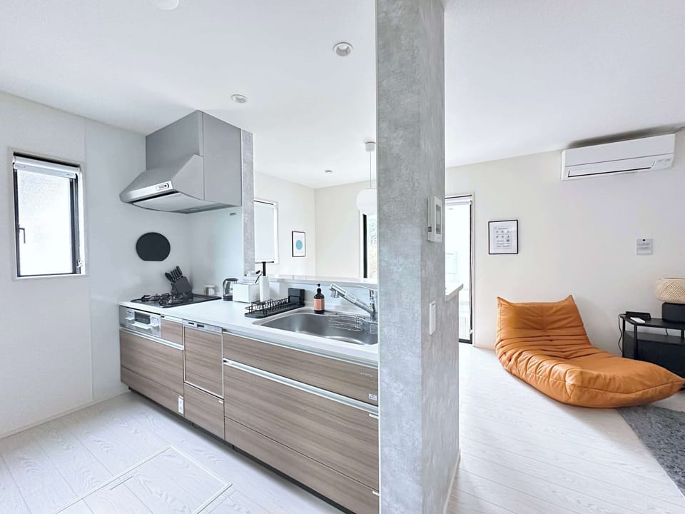 Kitchen area with counter and appliances.