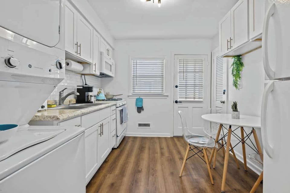 Prepare meals in a bright kitchen w/ ample counter space & casual seating