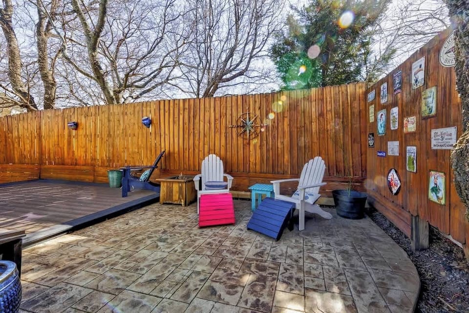 Private fenced patio w/ seating, ideal for relaxing outdoors in the fresh air