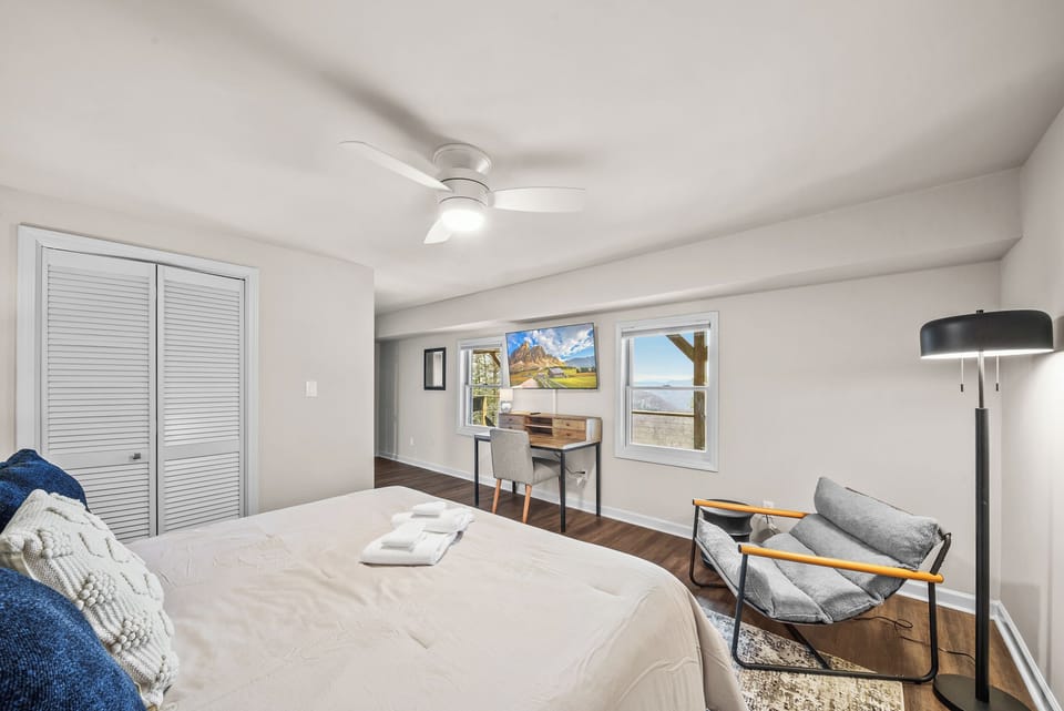 TV, Desk, and Private Bathroom in the King Bedroom