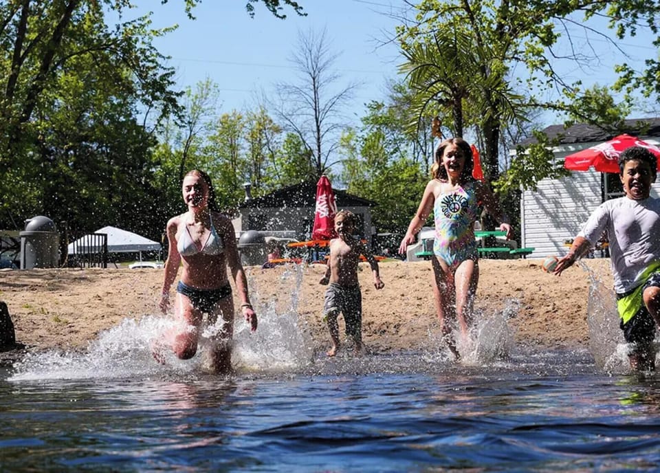 Kids can swim in the creek in confidence w/ the walk-in beachfront!
