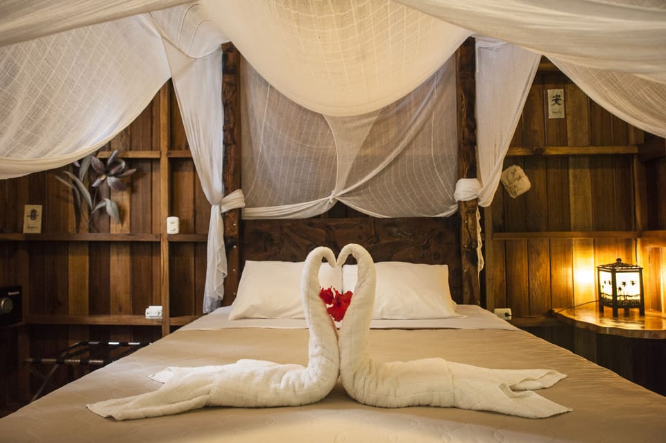 Standard Bungalow, 1 Queen Bed, Balcony, Garden Area | In-room safe, bed sheets