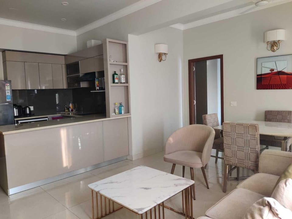 Luxury Apartment | Living area | 32-inch flat-screen TV with cable channels