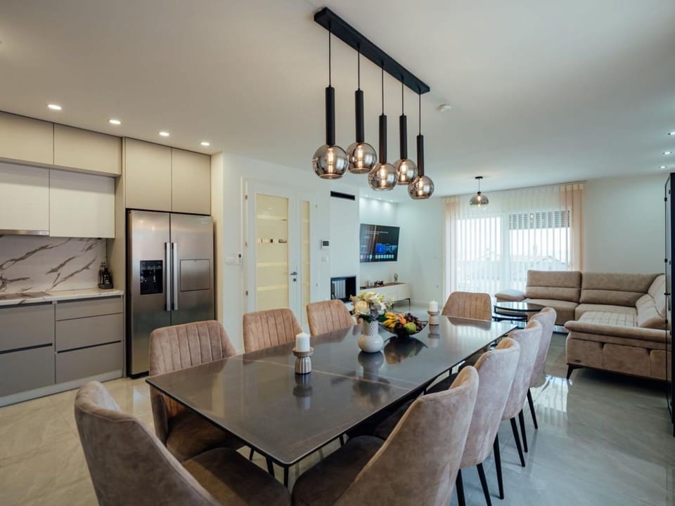 Furniture, Interior Design, Flooring, Light Fixture, Chair, Table, Wall, Dining Room, Chandelier, Kitchen & Dining Room Table