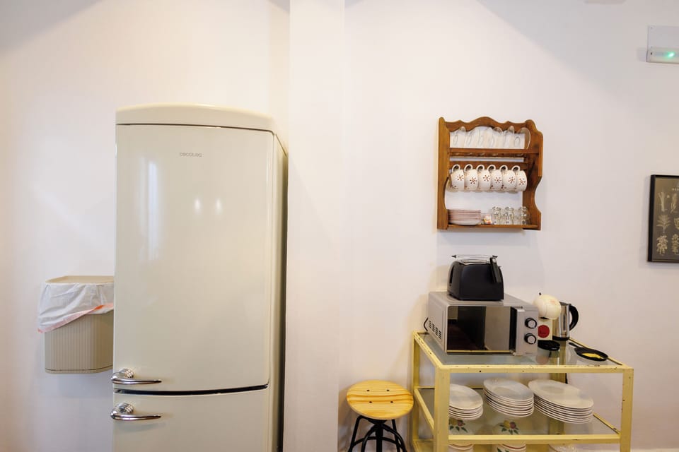 Deluxe Double Room, 1 King Bed, City View | Private kitchen | Full-size fridge, microwave, oven, stovetop