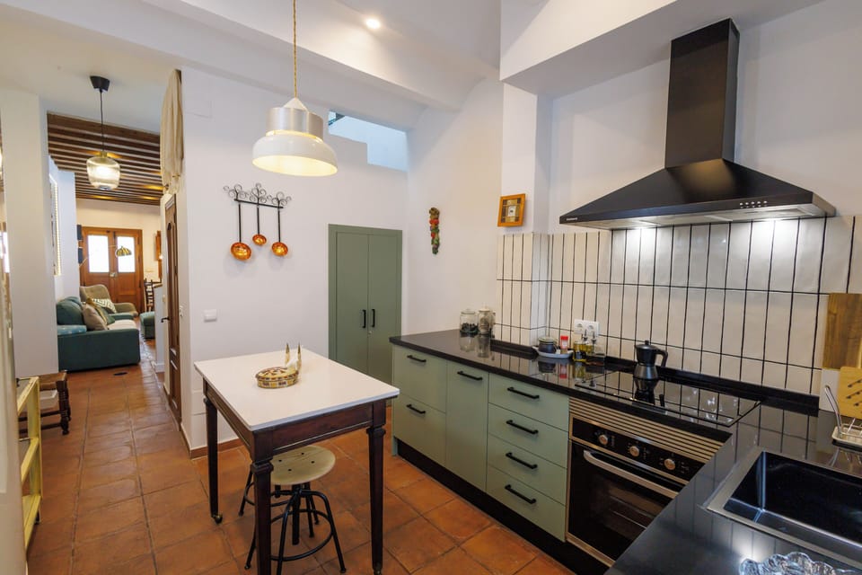 Deluxe Double Room, 1 King Bed, City View | Private kitchen | Full-size fridge, microwave, oven, stovetop