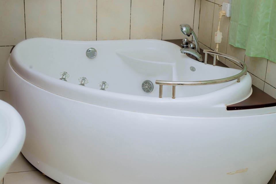 Family Room, Balcony, Lake View | Bathroom | Bathtub, free toiletries, bathrobes, slippers