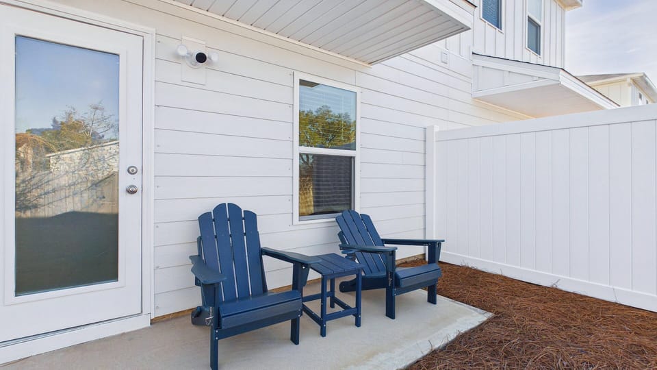 Back patio with Adirondack seating