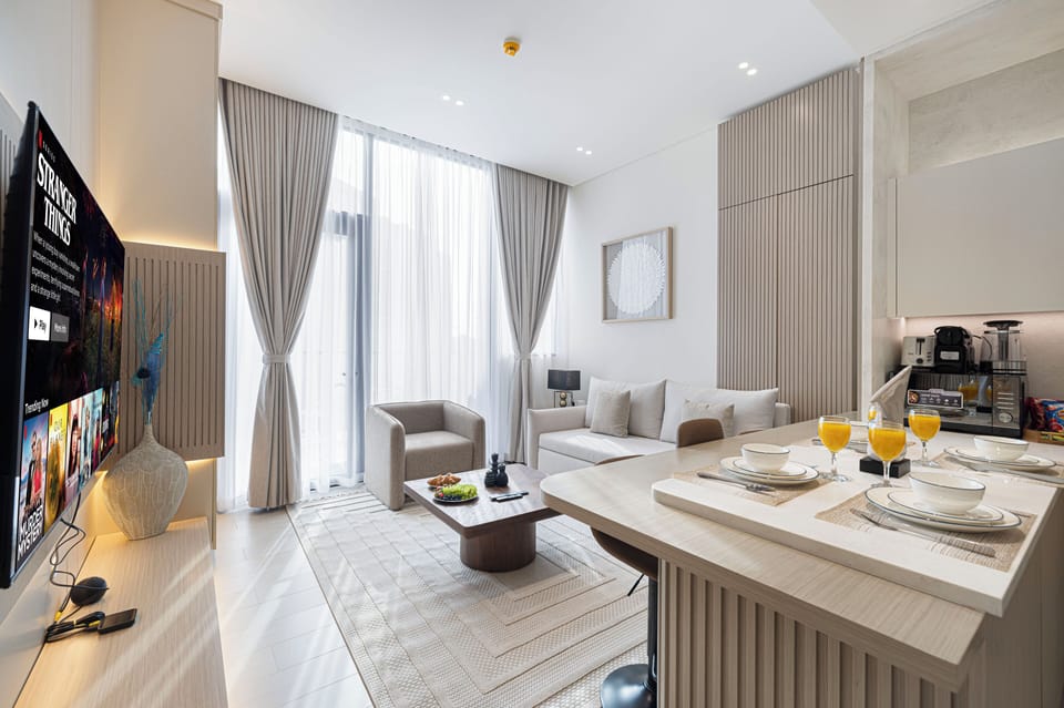 Luxury Apartment, Balcony, City View | Living area | Plasma TV