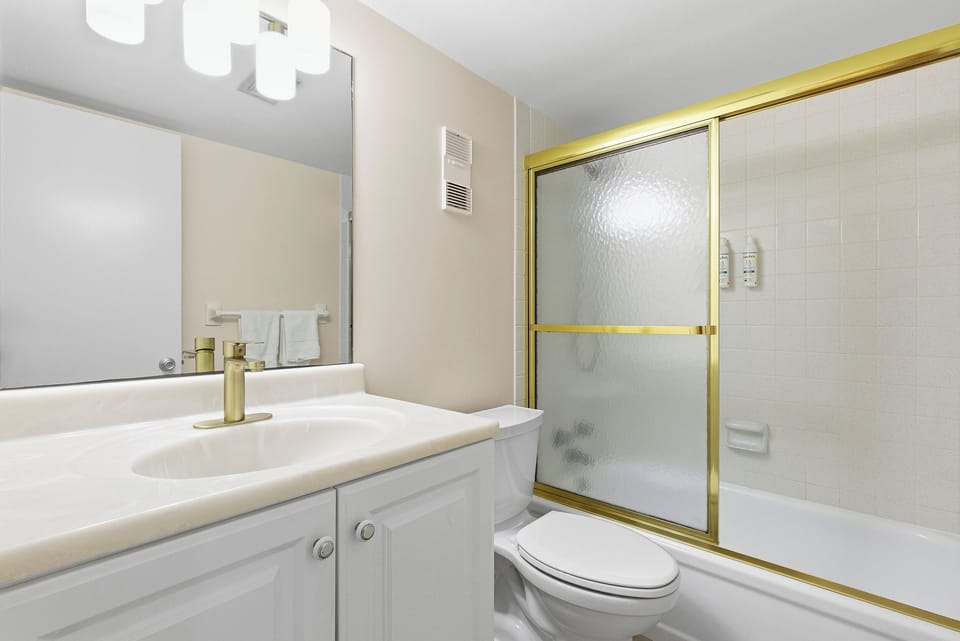 Guest Bathroom and shower tub combination