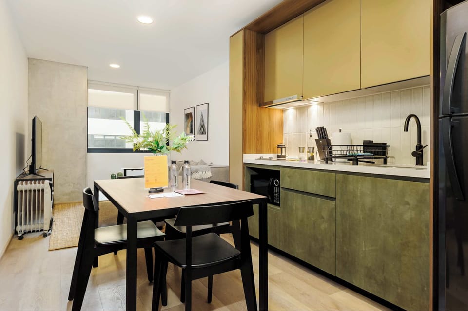 Dining area integrated into the living space, perfect for enjoying meals or working comfortably.