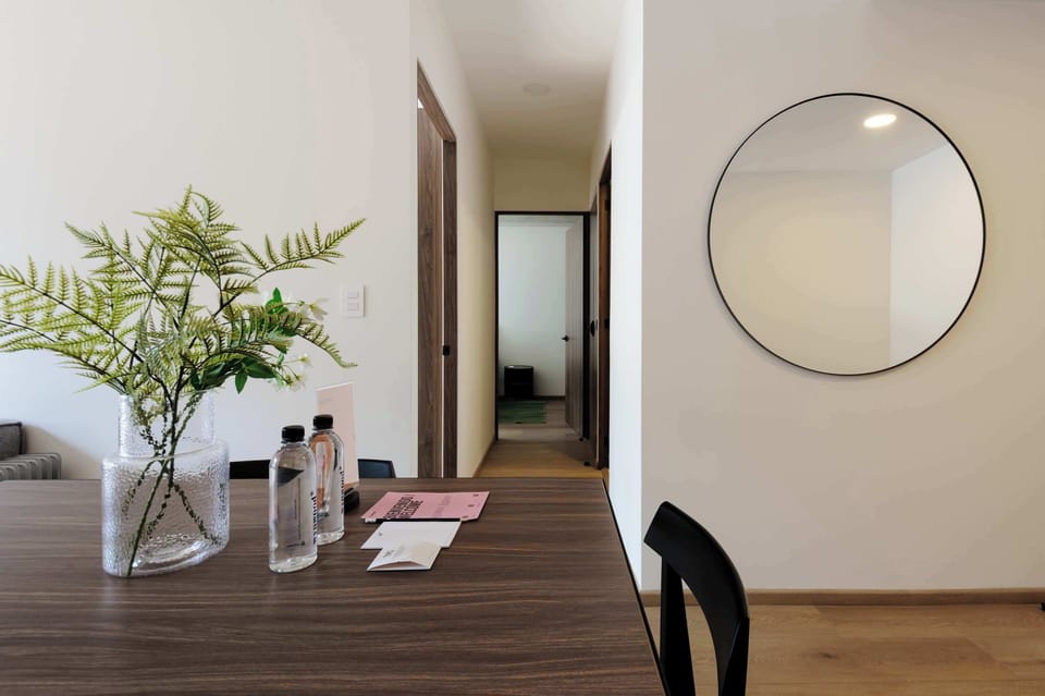Minimalist queen bedroom.