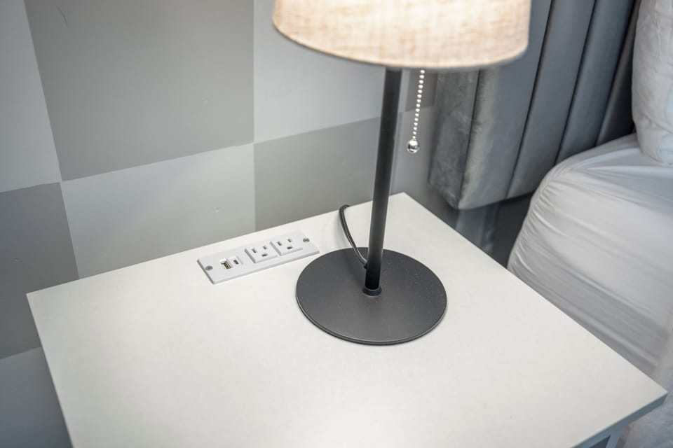 Plugs provided on all nightstands for easy charging of all devices