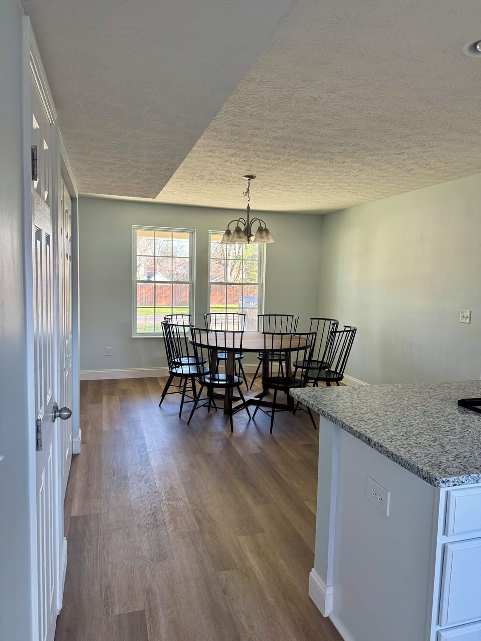 Eat in kitchen seats 8 at brand new round table.  Perfect for game night too!