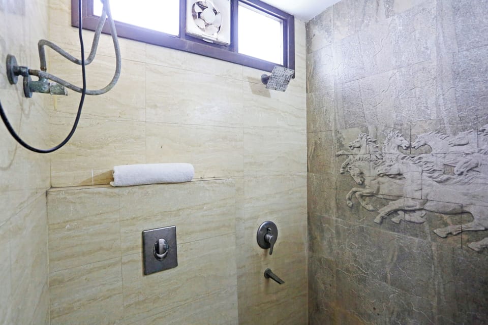 Basic Room, City View | Bathroom | Shower, free toiletries, slippers, towels