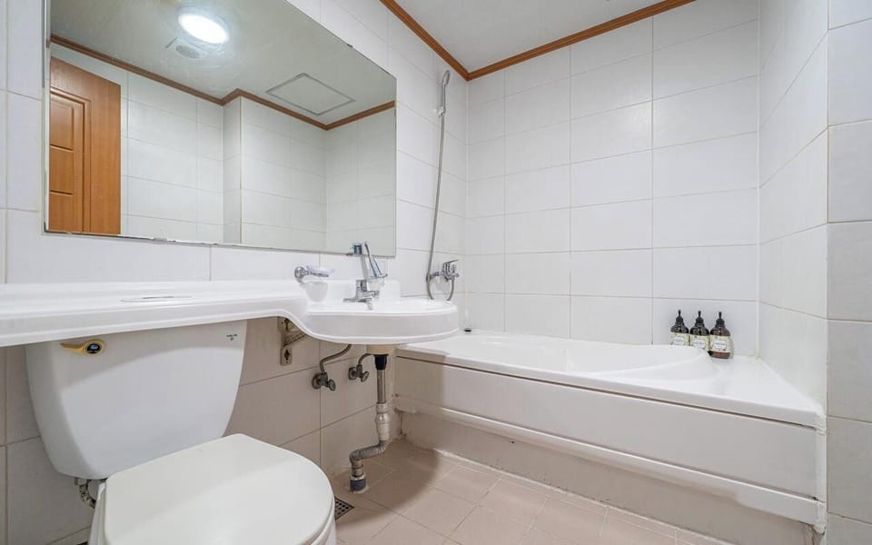 Standard Double Room | Bathroom | Shower, hair dryer, towels, soap