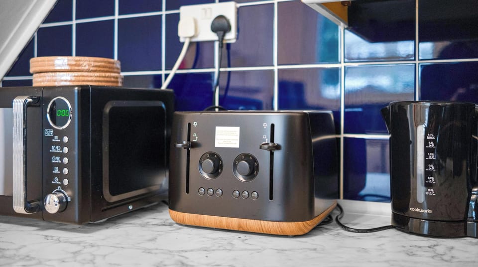 Kettle, toaster, and microwave for your everyday convenience.