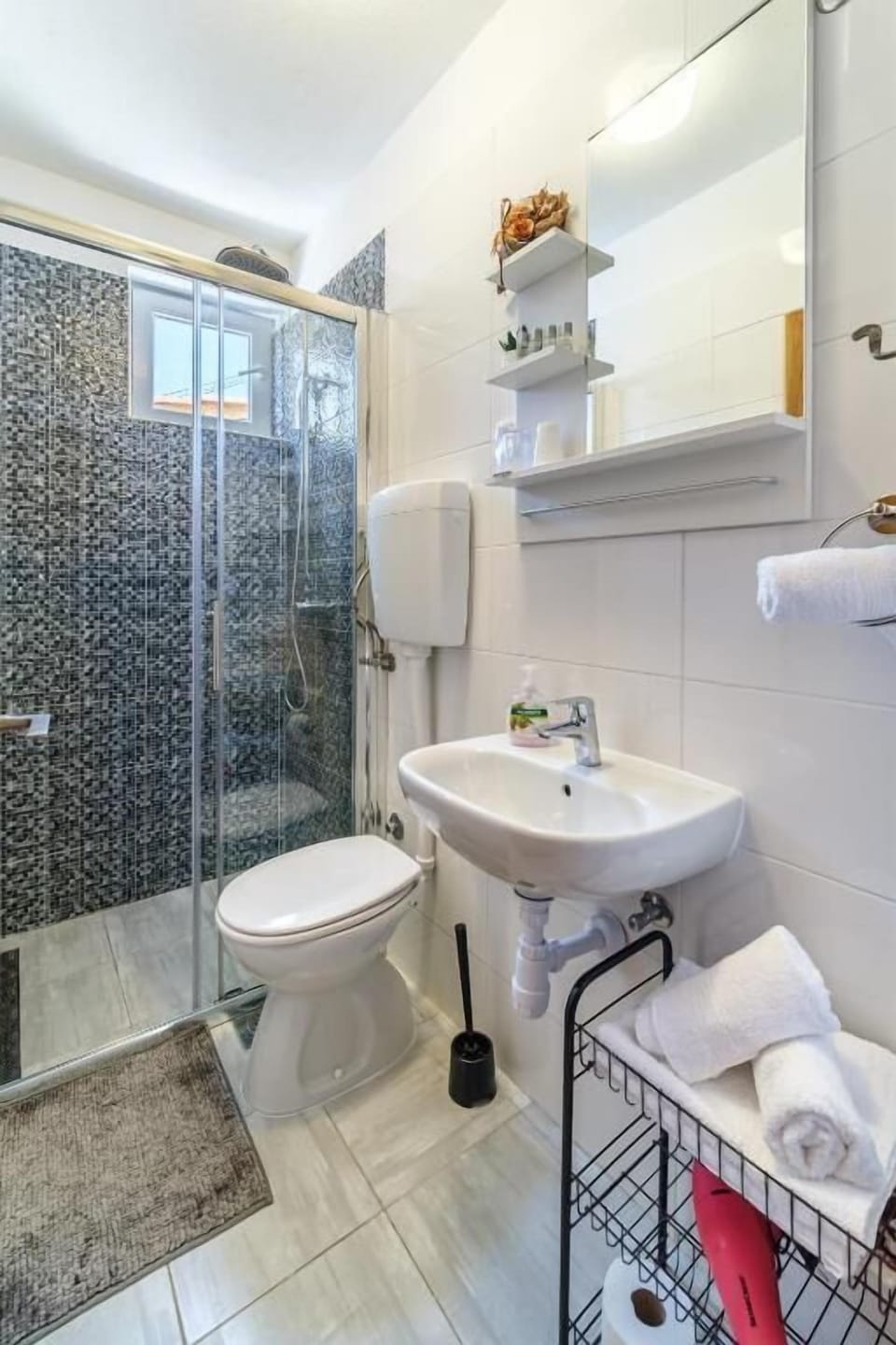Shower, free toiletries, hair dryer, towels